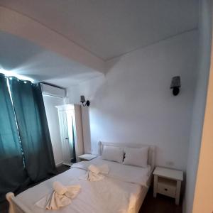 Postel nebo postele na pokoji v ubytování Adrys Boutique Villa