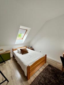 Postel nebo postele na pokoji v ubytování Garden Room