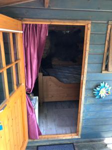Postel nebo postele na pokoji v ubytování Treehouse op het platteland van Huize Ouwervelden