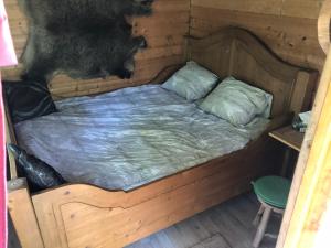 Postel nebo postele na pokoji v ubytování Treehouse op het platteland van Huize Ouwervelden