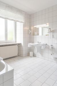 Ein Badezimmer in der Unterkunft Gasthof Stockhammer