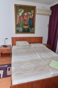 Voodi või voodid majutusasutuse Apartments Imper - IMD toas