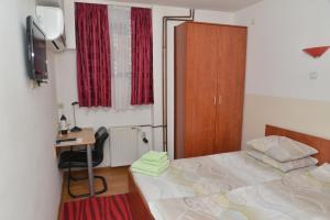 Voodi või voodid majutusasutuse Apartments Imper - IMD toas