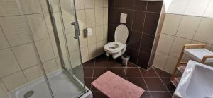 Kúpeľňa v ubytovaní Dália Apartman