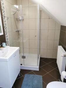 Kúpeľňa v ubytovaní Dália Apartman
