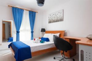 Ένα ή περισσότερα κρεβάτια σε δωμάτιο στο Violet House - Alcúdia