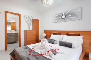 Ένα ή περισσότερα κρεβάτια σε δωμάτιο στο Violet House - Alcúdia