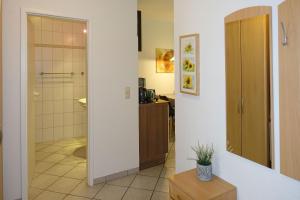 a bathroom with a walk in shower and a toilet at Gollwitzer Park Sturmvogel in Gollwitz