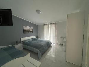 A bed or beds in a room at VILLA LUDO a ZAMBRONE TROPEA