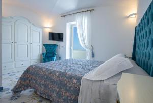 A bed or beds in a room at Villa Primavera