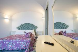 A bed or beds in a room at Villa Primavera