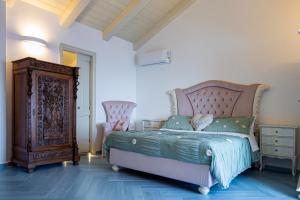 A bed or beds in a room at Villa Primavera