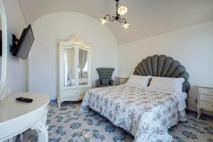A bed or beds in a room at Villa Primavera