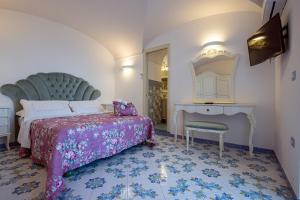 A bed or beds in a room at Villa Primavera