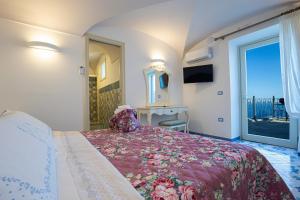 A bed or beds in a room at Villa Primavera