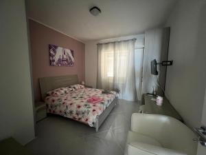 A bed or beds in a room at VILLA LUDO a ZAMBRONE TROPEA