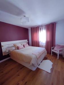 A bed or beds in a room at El Rincón del Alma Mía