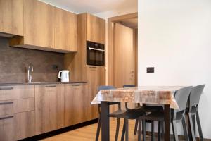 A kitchen or kitchenette at Appartamento Federia Casa Campacc