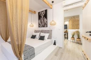 Posteľ alebo postele v izbe v ubytovaní Felicite apartments Naxos
