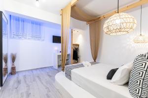 A bed or beds in a room at Felicite apartments Naxos