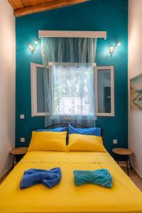 Posteľ alebo postele v izbe v ubytovaní Casa Max Palaiokastritsa Corfu