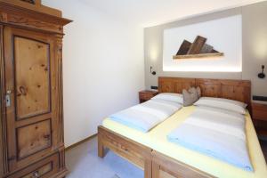 Postel nebo postele na pokoji v ubytování Faltnerhof