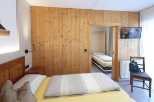 Postel nebo postele na pokoji v ubytování Faltnerhof