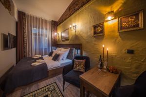 Postel nebo postele na pokoji v ubytování Ars Cracovia Apartments