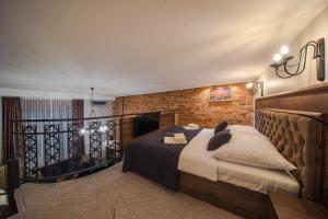 Posteľ alebo postele v izbe v ubytovaní Ars Cracovia Apartments