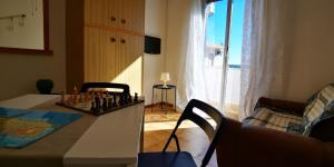 Μια τηλεόραση ή/και κέντρο ψυχαγωγίας στο Rooms GUITGIA