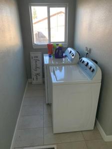 A kitchen or kitchenette at Stylish Basement Studio in Central El Paso - Very spacious