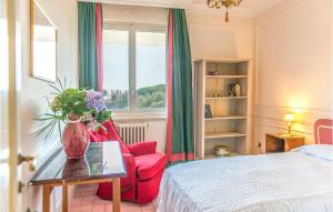 A bed or beds in a room at 5 Bedroom Amazing Home In Grottaferrata