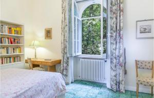 A bed or beds in a room at 5 Bedroom Amazing Home In Grottaferrata