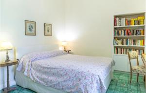 A bed or beds in a room at 5 Bedroom Amazing Home In Grottaferrata