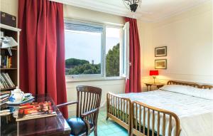 A bed or beds in a room at 5 Bedroom Amazing Home In Grottaferrata