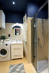 Kúpeľňa v ubytovaní Apartamenty Łazarza 17 + 25 fotografií
