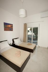 Postel nebo postele na pokoji v ubytování Sea Gem Apartment 1