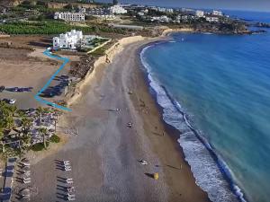 an aerial view of a beach with condos at BLUE CORAL BEACH VILLAS three exclusive villas - Poseidon - Nautilus - Oceanos - and - Baby Coral bungalow in Coral Bay +37 photos