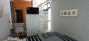Telewizja i/lub zestaw kina domowego w obiekcie ZARAUTZ LOFT 1