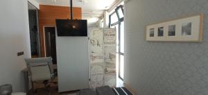 Telewizja i/lub zestaw kina domowego w obiekcie ZARAUTZ LOFT 1