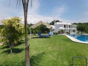 Bazén v ubytování Hotel Boutique Casa Bella nebo v jeho okolí