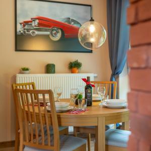 Svetainės erdvė apgyvendinimo įstaigoje Apartament Vintage