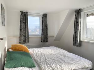 Ένα ή περισσότερα κρεβάτια σε δωμάτιο στο Op 't Landtweg 19