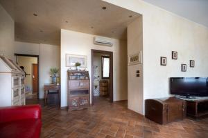 Μια τηλεόραση ή/και κέντρο ψυχαγωγίας στο Botero Central Apartment +16 φωτογραφίες