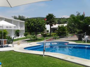 Bazén v ubytování Hotel Boutique Casa Bella nebo v jeho okolí