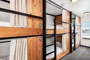 a bedroom with bunk beds in a tiny house at Kinship Landing in Colorado Springs