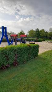 Herní místnost nebo prostor pro děti v ubytování `T Blauwtje Baarland