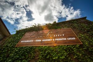 a sign on the side of a building at Ecocasa Lema II in Muxia