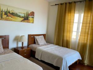 Una cama o camas en una habitación de Villa Isabela - Car Rental for Free