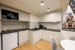 Kuchyňa alebo kuchynka v ubytovaní Native Apartments Paulińska 20 Superior